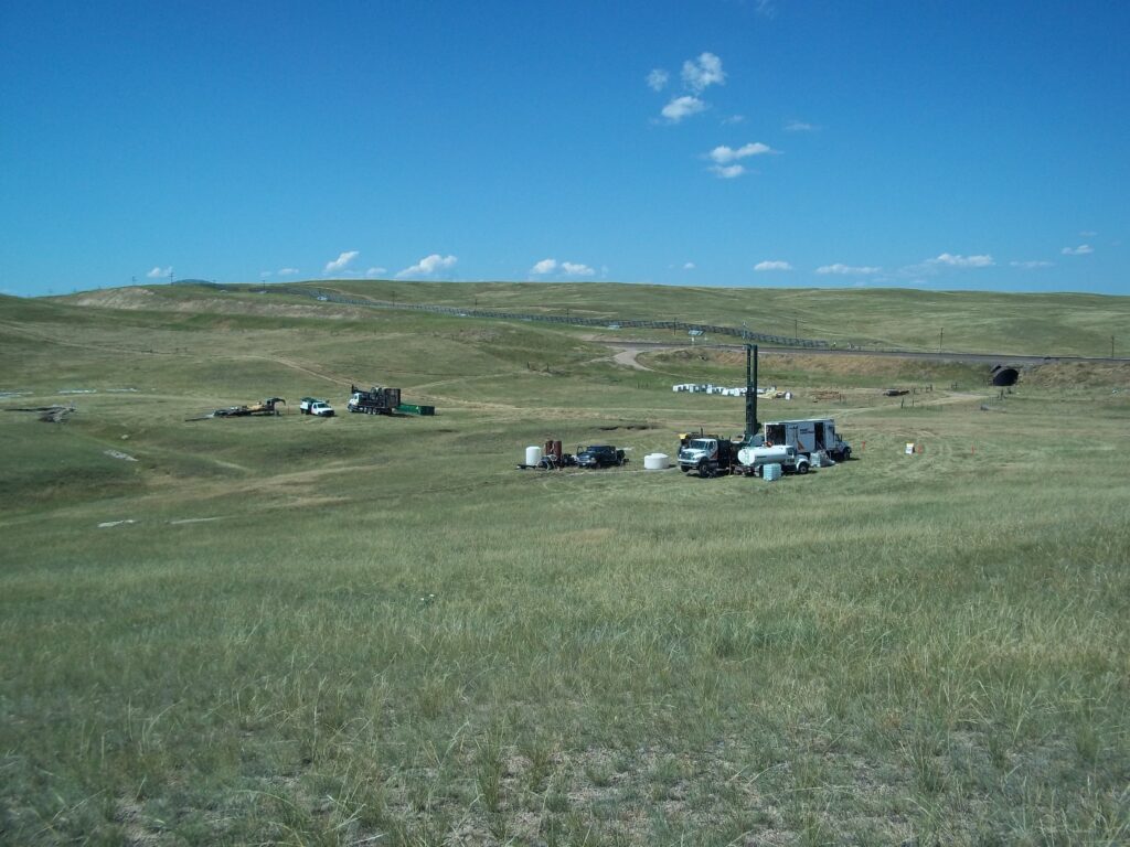 Photograph 9. Drilling equipment set up at Intercept Transect nested monitoring wells MW47 and MW48 in the west-central part of Area B