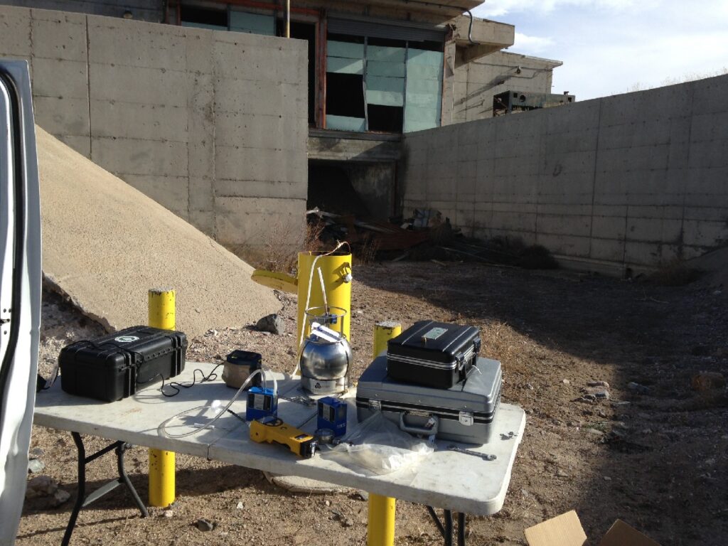 Photograph 5. Nested monitoring well MW64 located in the flame pit at LSB3. Many of the nested well installations in the source area were constructed with soil gas ports to allow vapor sampling from the vadose zone.