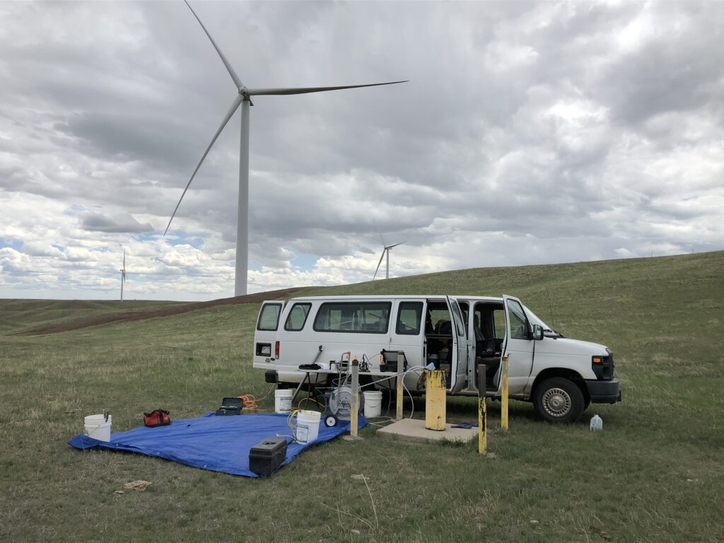 Photograph 10. Intercept Transect nested monitoring well MW46 with sampling setup in progress.