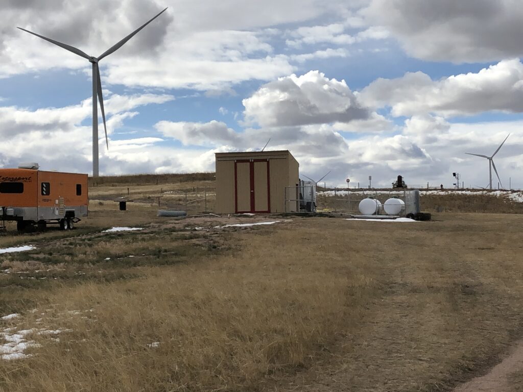 Photograph 14. The PTI system Treatment shed after construction, looking west. A propane-powered generator was used to provide electricity for the extraction well pump.